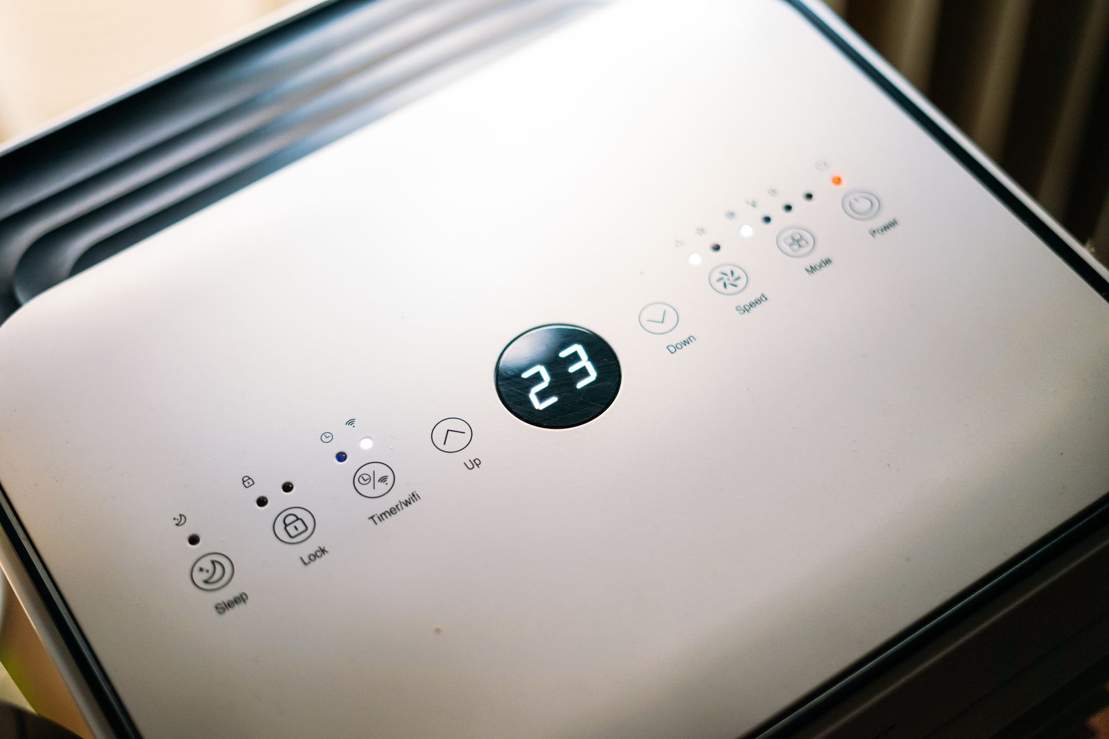 Air conditioning control panel set to 23 degrees